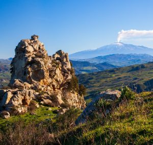 View of the Sicilian countryside. Etna volcano in the background